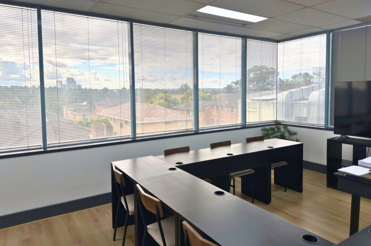 Classroom at Alfred's Maths Tutoring in Eastwood with large windows